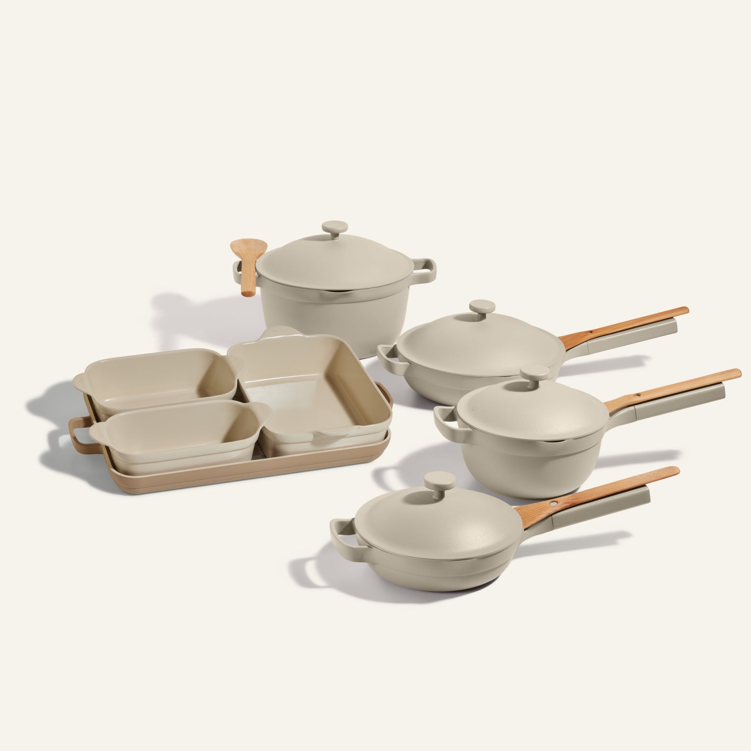 our-place-product-thumbnail-ultimate-cookware-set-always-pan-perfect-pot-mini-griddle-bakers-pan-steam.jpg